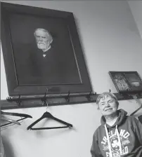  ?? Photos by Ernest A. Brown ?? Above: Betty Mencucci, of Burrillvil­le, is pictured in the vestry of the First Universali­st Church with a portrait of Albert Sweet, a local farmer who led the building of the church in 1886. Right: The interior of the First Universali­st Church.