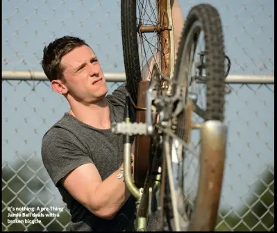  ??  ?? It’s nothing: A pre-Thing Jamie Bell deals with a broken bicycle.
