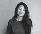  ?? INVISION] [TAYLOR JEWELL/ ?? Writer-director Chloe Zhao in 2018 at the Sundance Film Festival. Her latest film is “Nomadland.”