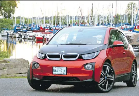  ?? JOHN LEBLANC/ DRIVING ?? It’s quick, handles well and the futuristic 2015 BMW i3’ s interior is more relaxing than the typical compact car.