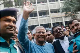  ?? Photograph: Rehman Asad/AFP/Getty Images ?? Muhammad Yunus waves to supporters outside a court in Dhaka where he was granted bail on 3 March.