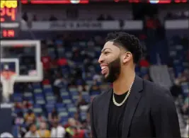  ?? Gerald Herbert The Associated Press ?? Forward Anthony Davis remains out of the Pelicans lineup as New Orleans has until noon Thursday to deal their star after he made a trade request.