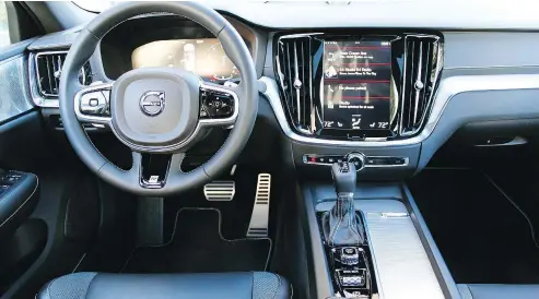  ??  ?? Volvo’s Sensus Connect infotainme­nt with its nine-inch, portrait-oriented touch screen comes as standard.