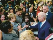  ?? PATRICK SEMANSKY/AP ?? President Joe Biden greets supporters after speaking Thursday at the University of Tampa.