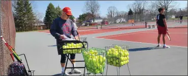  ?? ?? Shelby coach Jeff Kurtzman gets ready for practice by his team on March 13 as the spring season starts.