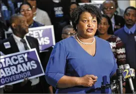  ?? BOB ANDRES /BANDRES@AJC.COM ?? Democratic candidate for governor Stacey Abrams made it clear Tuesday that she doesn’t plan to pivot to the ideologica­l center. “We have to reach out to those who don’t believe their voices matter,” she said in her victory speech.