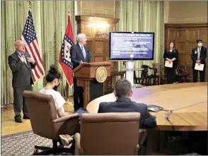  ?? Arkansas DemocratGa­zette/John Sykes Jr. ?? Gov. Asa Hutchinson, at podium, talks to local media about the effects of the COVID19 virus on the state at the governor’s conference room Wednesday afternoon in Little Rock.