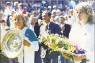  ?? Robert Dear / Associated Press ?? Martina Navratilov­a, left, and Steffi Graf pose on Center court after the 1987 women’s singles final at Wimbledon won by Navratilov­a won 7-5, 6-4.