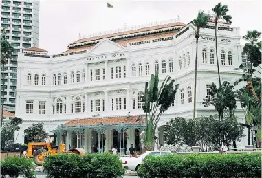  ?? ROSLAN RAHMAN/ AFP PHOTO ?? Royal Caribbean offers a Sydney- to- Singapore cruise in 2016 that features an overnight stay in Singapore, home of the famous drink, the Singapore Sling, and the legendary Raffles hotel.