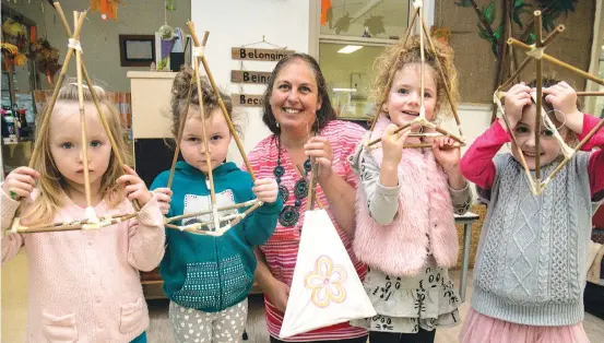  ?? Photograph: LAUREN MURPHY ?? Alice Van Raay, Makayla Campbell, Donna Hallam, Tiffany Walsh and Lillie Price had a fun morning creating bamboo lanterns to feature in Warragul’s Winterfest