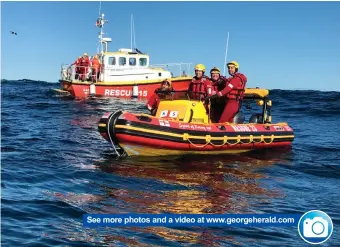  ??  ?? See more photos and a video at www.georgehera­ld.com The NSRI Wilderness crew take a breather after a successful rescue mission on Monday just off the coast of Herold’s Bay. Crew members are, from left: Jonathan Britton, Andrew Burrell, Warren Page, Francois Potgieter on Spirit of Rotary. The photo was taken by Michael Vonk from the other rescue boat, Levenia.