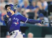  ?? ORLIN WAGNER / THE CANADIAN PRESS FILES ?? Blue Jays’ Devon Travis is proving to be fully recovered from off-season knee surgery and is determined to be ready for the season opener in two weeks time.