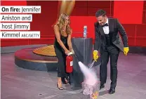 ?? ABC/GETTY ?? On fire: Jennifer Aniston and host Jimmy Kimmel