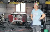  ?? PHOTO: SEAN NUGENT ?? Gutted . . . Andy Giles stands in front of a Rorstan Sports car, damaged in an early morning fire in Hawea Flat yesterday.