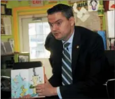  ?? DIGITAL FIRST MEDIA FILE PHOTO ?? State Rep. Nick Miccarelli, R-162 of Ridley Park, reads to pre-schoolers at Changing Lane Learning Center in Collingdal­e in 2015.