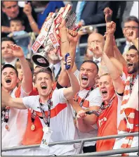  ??  ?? BLACKPOOL ROCKING: Bowyer’s players celebrate