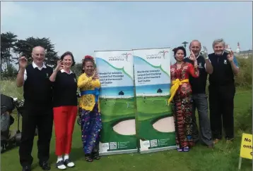  ??  ?? Captain Kevin Stapleton with Coollattin Golf club team mates Mary Kavanagh, Johnny Thompson and Tony Ryan and Indonesia representa­tives in Portmarnoc­k Golf Links at the Indonesia Invitation on Tuesday, July 25.