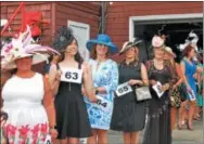  ?? LAUREN HALLIGAN LHALLIGAN@DIGITALFIR­STMEDIA.COM ?? Ladies look their best for the 27th annual Hat Contest on Sunday at the Saratoga Race Course.