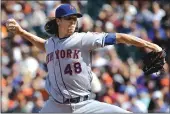  ??  ?? New York Mets pitcher Jacob deGrom throws against the San Francisco Giants during the first inning of Saturday’s game at At&T Park in San Francisco. The Mets won, 5-1.