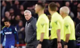  ?? Photograph: Mike Egerton/PA ?? David Moyes appears unimpresse­d after his side conceded a late penalty and then were denied a spot-kick of their own.