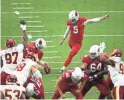  ?? ROB SCHUMACHER/THE REPUBLIC ?? Cardinals kicker Zane Gonzalez (5) kicks a field goal against the Washington Football Team on Sept. 20.