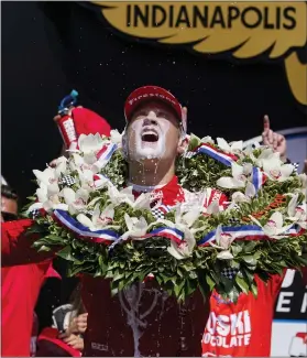  ?? AP ?? Marcus Ericsson celebrates after winning the Indianapol­is 500 auto race at Indianapol­is Motor Speedway in Indianapol­is on Sunday.