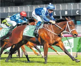  ?? Photo / Getty Images ?? Hugh Bowman and Winx win the Turnbull Stakes yesterday.