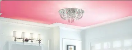  ??  ?? Why not have some fun with your child’s bedroom ceiling? Here, traditiona­l crown moulding is used to frame a high-impact favourite colour.