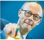  ?? ?? Friedrich Merz (CDU) bemüht sich um die Gewerkscha­ften.