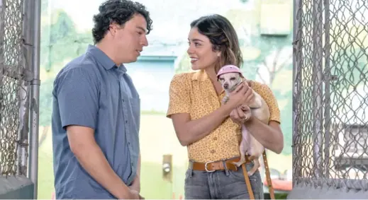  ?? JACOB YAKOB/LD ENTERTAINM­ENT ?? Jon Bass stars as Garrett, who has started a dog-rescue operation and pines for Tara (played by Vanessa Hudgens), in ‘‘Dog Days.’’