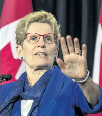  ?? CRAIG ROBERTSON/TORONTO SUN ?? Ontario Premier Kathleen Wynne answers questions about hydro at Queen’s Park in Toronto on Monday.