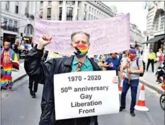  ?? AFP ?? Gay rights activist Peter Tatchell leads a march with campaigner­s to mark the 50th anniversar­y of the London Gay Liberation Front’s formation.