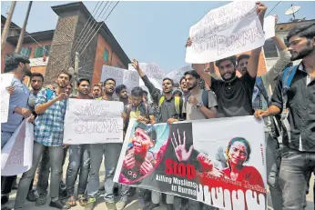  ??  ?? TAKING A STAND: Kashmiri students gather at a protest in Srinagar, India, against the killings of Rohingya in Myanmar. Hundreds of Rohingya deaths were recorded between Aug 25 and Tuesday.