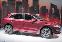  ?? GRAEME FLETCHER/DRIVING ?? The 2018 Audi Q5L is the first of 10 new crossovers, many expected to be electrifie­d, being launched by 2022.