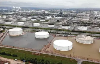  ?? Brett Coomer / Staff file photo ?? Petrochemi­cal plants are shown after Hurricane Harvey on Aug. 29, 2017, in Deer Park. Another 500-year flood would completely swamp many Houston-area plants, Jupiter Intelligen­ce reported.