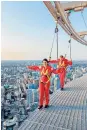  ??  ?? High spirits: thrill-seekers take part in the EdgeWalk