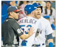  ?? Robert Sabo ?? HAD ENOUGH: Todd Frazier is held back after being tossed from Saturday’s game.