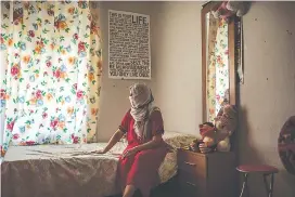  ?? PHOTOS BY MARIA CONTRERAS COLL/THE NEW YORK TIMES ?? One of the 10 Moroccan women who filed lawsuits against a strawberry farm is seen in Huelva, Spain, on June 23.