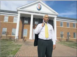  ?? STAFF PHOTO BY ANDREW RICHARDSON ?? Retired Maryland State Police homicide investigat­or Ted Jones stands before the Charles County Circuit Court in La Plata, where he now works as the state’s attorney’s chief investigat­or.