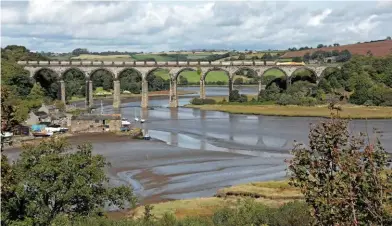  ??  ?? In his speech to the Labour conference, Shadow Chancellor John McDonnell said his party, if elected, would electrify the railway from Cornwall to London. On September 21, Colas Rail 70810 leads empty cement tanks over St Germans Viaduct, with a Moorswater­Aberthaw train. DAVID IVE.