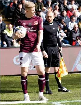  ?? ?? Alex Cochrane provided the corner that brought about Hearts’ winner