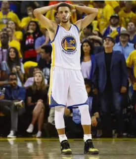  ?? AFP/ GETTY IMAGES ?? BEST SHOOTER MISSES Stephen Curry of the Golden State Warriors puts his hands on the back of his head in frustratio­n after missing a shot in Game 7.