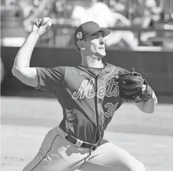  ?? REINHOLD MATAY/USA TODAY SPORTS ?? David Robertson has 157 career saves, including 20 last season.