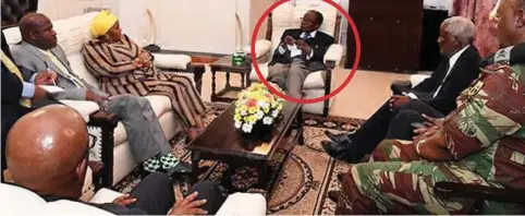  ??  ?? Relaxed: Mugabe, circled, with the South African defence minister and General Chiwenga yesterday