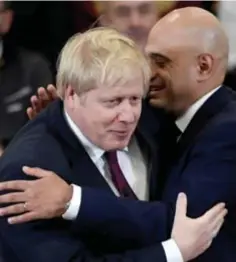  ?? FOTO REUTERS ?? Premier Boris Johnson kwam in contact met de positief geteste minister van Volksgezon­dheid Sajid Javid.
