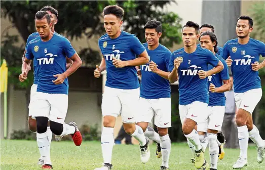  ??  ?? Hard at work: The national players undergoing training at Wisma FAM in Kelana Jaya yesterday. Malaysia face North Korea in the Asian Cup qualifying Group B match in Thailand on Friday. — MUHAMAD SHAHRIL ROSLI/ The Star