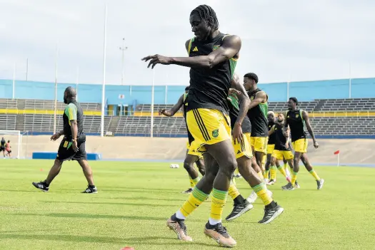  ?? KENYON HEMANS/PHOTOGRAPH­ER ?? Reggae Boyz in training at the National Stadium.