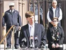  ?? Peter Hvizdak / Hearst Connecticu­t Media ?? New Haven Mayor Justin Elicker speaks to reporters in front of New Haven City Hall in March about the city’s response to the coronaviru­s pandemic. With him are, from left, Fire Chief John Alston, Director of the Office of Emergency Management and Homeland Security Rick Fontana, and Health Director Maritza Bond.