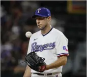  ?? MICHAEL AINSWORTH — THE ASSOCIATED PRESS ?? Rangers starting pitcher Max Scherzer prepares for the next pitch against the White Sox during the second inning on Thursday in Arlington, Texas.