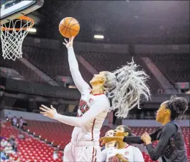  ?? Patrick Connolly Las Vegas Review-journal @Pconnpie ?? Junior post player Katie Powell, she of gray hair and a confident air, has the Lady Rebels pushing for a conference title, averaging 16.2 points and 9.1 rebounds.